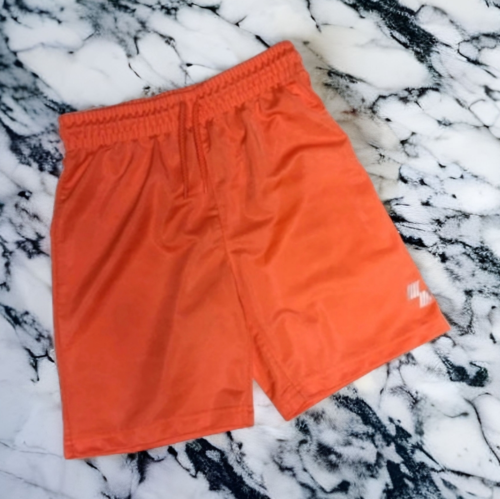 CP orange basketball shorts